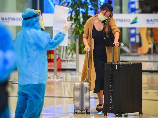 Hành khách nào đi máy bay dịp Tết Nguyên đán phải test COVID-19? - Ảnh 1. Hành khách nào đi máy bay dịp Tết Nguyên đán phải test COVID-19? - Ảnh 1.