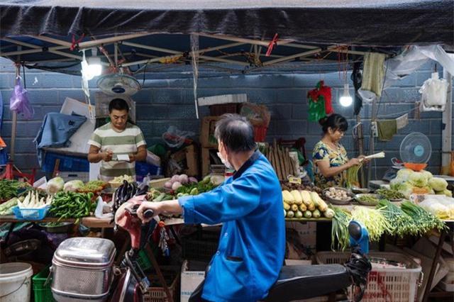 CPI tháng 7 giảm, chuyên gia lo kinh tế Trung Quốc phục hồi chậm - Ảnh 1. CPI tháng 7 giảm, chuyên gia lo kinh tế Trung Quốc phục hồi chậm - Ảnh 1.