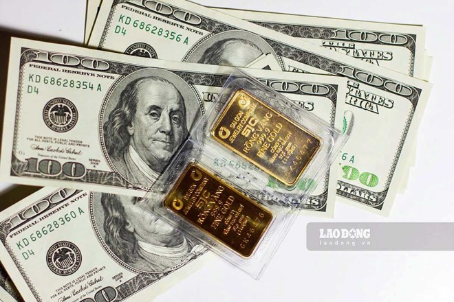 Đồng USD lao dốc mở đường cho Bitcoin thách thức giá vàng