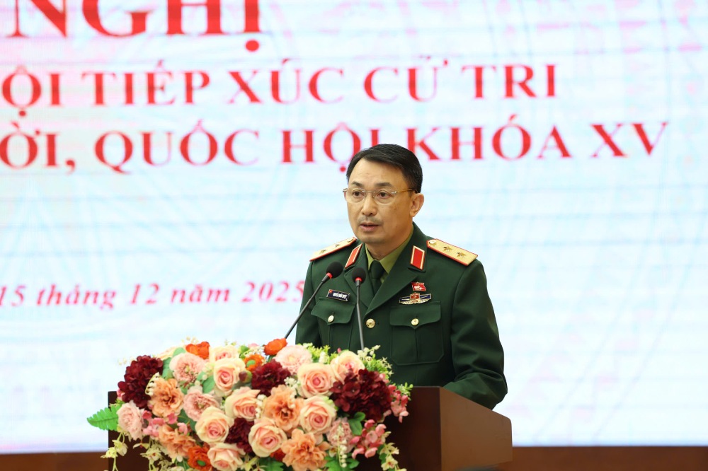 Đại biểu Quốc hội Nguyễn Quốc Duyệt thông báo kết quả Kỳ họp thứ 10, Quốc hội khóa XV. Ảnh: Phạm Đông