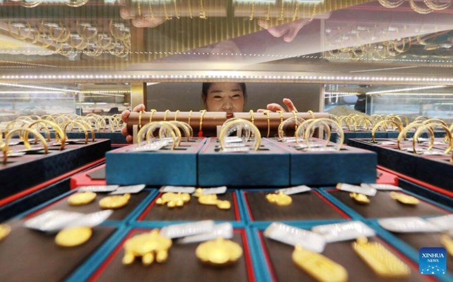 Giá vàng, bạc sụt giảm được kích hoạt bởi đà phục hồi của đồng USD