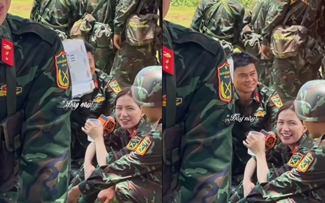 Văn Cương cầm tờ báo quạt cho Hòa Minzy. Ảnh cắt từ video